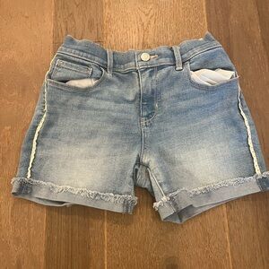 Old navy size 14 girls frayed with white lines on the side jeans shorts.
